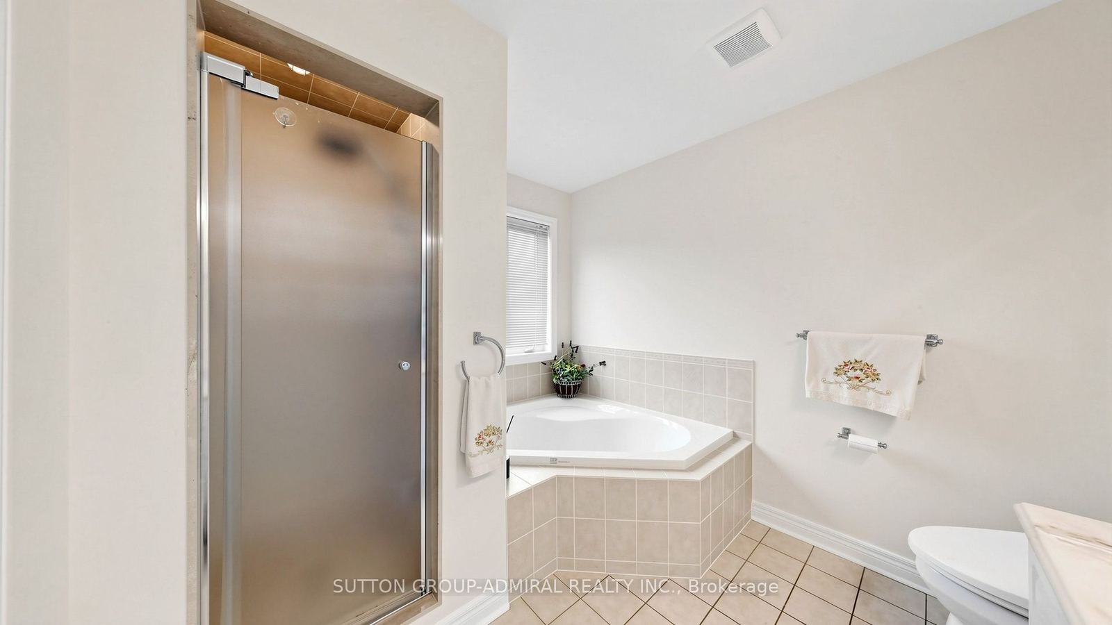 Ensuite with corner soaking tub